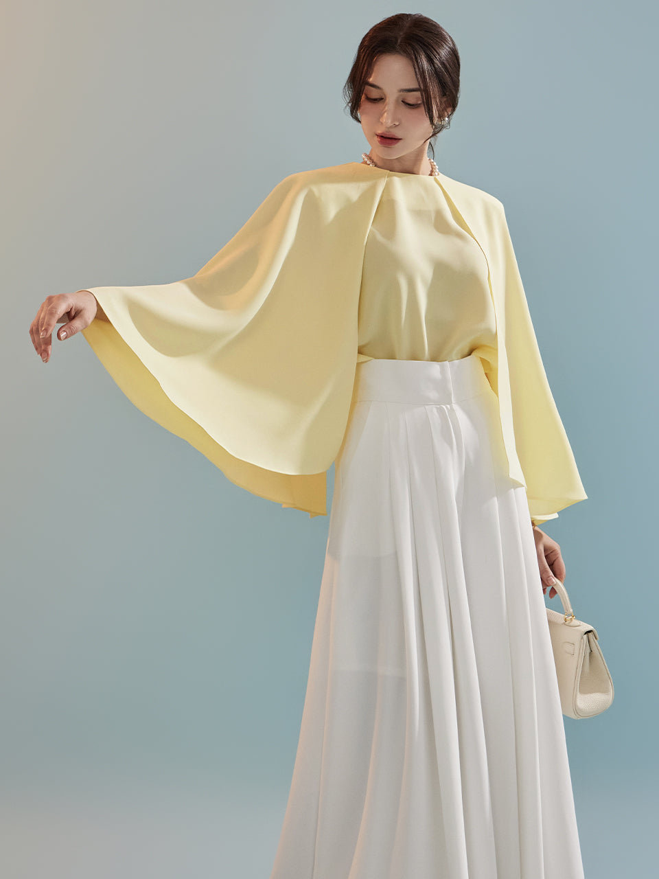 B2723 Sleeveless Cape Design Blouse